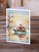 Load image into Gallery viewer, Cajun Santa Claus Delivering Gifts by Airboat Christmas Greeting Cards Pack of 8