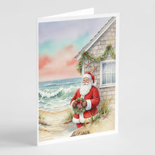 Load image into Gallery viewer, Santa Claus by the Seaside Cottage Christmas Greeting Cards Pack of 8