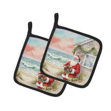 Load image into Gallery viewer, Santa Claus by the Seaside Cottage Christmas Pair of Pot Holders