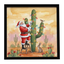 Load image into Gallery viewer, Santa Claus Decorating a Cactus Christmas Framed Metal Print