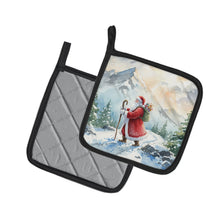 Load image into Gallery viewer, Santa Claus Hiking in the Mountains Christmas Pair of Pot Holders