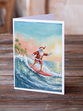 Load image into Gallery viewer, Santa Claus Surfing the Pacific Christmas Greeting Cards Pack of 8