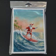 Load image into Gallery viewer, Santa Claus Surfing the Pacific Christmas Greeting Cards Pack of 8