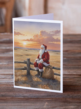 Load image into Gallery viewer, Santa Claus Watching the Sunset on the Prairie Christmas Greeting Cards Pack of 8