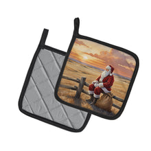 Load image into Gallery viewer, Santa Claus Watching the Sunset on the Prairie Christmas Pair of Pot Holders