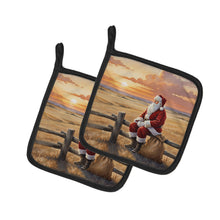 Load image into Gallery viewer, Santa Claus Watching the Sunset on the Prairie Christmas Pair of Pot Holders
