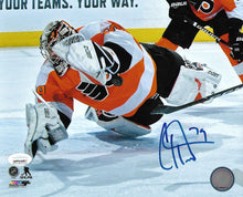 Load image into Gallery viewer, Carter Hart Philadelphia Flyers Diving Save vs. Canucks Autographed NHL Hockey Photo