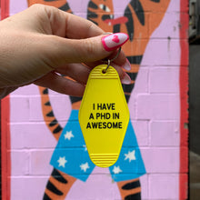 Load image into Gallery viewer, I Have a PhD in Awesome Yellow Motel Style Keychain