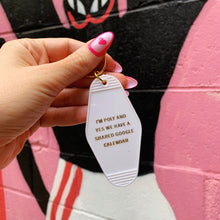 Load image into Gallery viewer, I'm Poly and Yes We Have a Shared Google Calendar Motel Style Keychain in White and Gold | Polyamory Themed Funny Key Tag