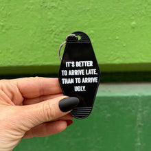 Load image into Gallery viewer, It's Better To Arrive Late, Than To Arrive Ugly Keychain in Black and White
