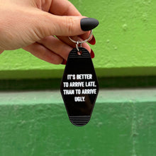 Load image into Gallery viewer, It's Better To Arrive Late, Than To Arrive Ugly Keychain in Black and White