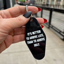 Load image into Gallery viewer, It's Better To Arrive Late, Than To Arrive Ugly Keychain in Black and White