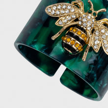 Load image into Gallery viewer, Stripey bee resin napkin rings, green tortoiseshell, set of four
