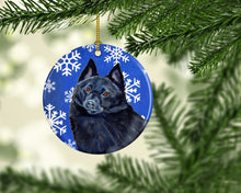 Load image into Gallery viewer, Schipperke Winter Snowflake Holiday Ornament - Round Ceramic Ornament – Artist-Designed Keepsake Decoration LH9294