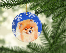 Load image into Gallery viewer, Pomeranian Winter Snowflake Holiday Ornament - Round Ceramic Ornament – Artist-Designed Keepsake Decoration LH9305