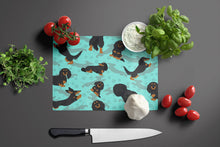 Load image into Gallery viewer, Longhaired Black Tan Dachshund Glass Cutting Boards – Durable, Decorative Kitchen Art Large