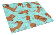 Load image into Gallery viewer, Longhaired Red Dachshund Glass Cutting Boards – Durable, Decorative Kitchen Art Large