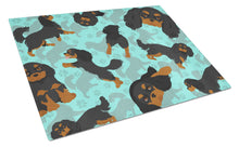 Load image into Gallery viewer, Black and Tan Cavalier King Charles Spaniel Glass Cutting Boards – Durable, Decorative Kitchen Art Large