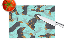 Load image into Gallery viewer, Black and Tan Dachshund Glass Cutting Boards – Durable, Decorative Kitchen Art Large