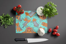 Load image into Gallery viewer, Blue and Tan Yorkie Glass Cutting Boards – Durable, Decorative Kitchen Art Large