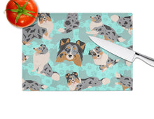 Load image into Gallery viewer, Blue Merle Sheltie Glass Cutting Boards – Durable, Decorative Kitchen Art Large
