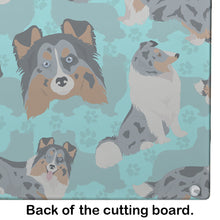 Load image into Gallery viewer, Blue Merle Sheltie Glass Cutting Boards – Durable, Decorative Kitchen Art Large