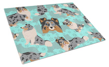 Load image into Gallery viewer, Blue Merle Sheltie Glass Cutting Boards – Durable, Decorative Kitchen Art Large