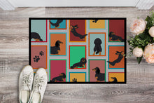 Load image into Gallery viewer, Lots of Longhaired Black Tan Dachshund Doormat - 24x36 Decorative Floor Mat – Indoor/Outdoor Rug with Artistic Flair