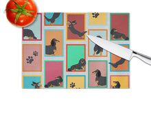 Load image into Gallery viewer, Lots of Longhaired Black Tan Dachshund Glass Cutting Boards – Durable, Decorative Kitchen Art Large