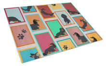 Load image into Gallery viewer, Lots of Longhaired Black Tan Dachshund Glass Cutting Boards – Durable, Decorative Kitchen Art Large