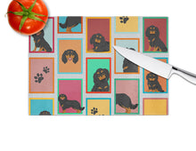 Load image into Gallery viewer, Lots of Black and Tan Cavalier King Charles Spaniel Glass Cutting Boards – Durable, Decorative Kitchen Art Large