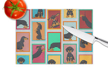 Load image into Gallery viewer, Lots of Black and Tan Dachshund Glass Cutting Boards – Durable, Decorative Kitchen Art Large