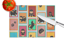 Load image into Gallery viewer, Lots of Black and Tan Pomeranian Glass Cutting Boards – Durable, Decorative Kitchen Art Large