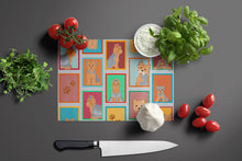 Load image into Gallery viewer, Lots of Blue and Tan Yorkie Glass Cutting Boards – Durable, Decorative Kitchen Art Large