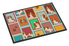 Load image into Gallery viewer, Lots of Blenheim Cavalier Spaniel Doormat - 24x36 Decorative Floor Mat – Indoor/Outdoor Rug with Artistic Flair
