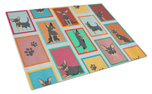 Load image into Gallery viewer, Lots of Black and Tan Chihuahua Glass Cutting Boards – Durable, Decorative Kitchen Art Large