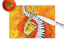 Load image into Gallery viewer, Something Blues Saxaphone and Piano Glass Cutting Boards – Durable, Decorative Kitchen Art