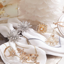 Load image into Gallery viewer, Classic snowflake skinny napkin rings, crystal, set of four