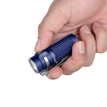 Load image into Gallery viewer, OLIGHT BATON4KITRGBU Baton 4 Powerful EDC Flashlight 1300 Lumens - Regal Blue - Premium (With Charging Case)