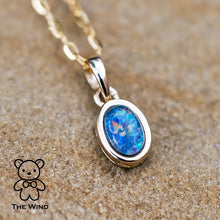 Load image into Gallery viewer, Oval Shaped Australian Triplet Opal Necklace in 14k Yellow Gold