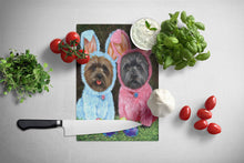 Load image into Gallery viewer, Cairn Terrier Easter Bunnies Glass Cutting Boards – Durable, Decorative Kitchen Art Large PPP3046LCB
