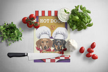 Load image into Gallery viewer, Dachshund Hot Dog Stand Glass Cutting Boards – Durable, Decorative Kitchen Art Large PPP3083LCB