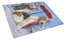 Load image into Gallery viewer, Fox Terrier Christmas We Believe Glass Cutting Boards – Durable, Decorative Kitchen Art Large PPP3094LCB