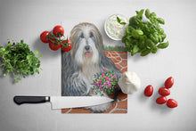 Load image into Gallery viewer, Bearded Collie Pot of Roses Glass Cutting Boards – Durable, Decorative Kitchen Art Large PPP3141LCB