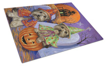 Load image into Gallery viewer, Yorkie Halloween Haunted House Glass Cutting Boards – Durable, Decorative Kitchen Art Large PPP3241LCB