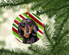 Load image into Gallery viewer, Dachshund Candy Cane Holiday Christmas  Ornament - Round Ceramic Ornament – Artist-Designed Keepsake Decoration SC9323