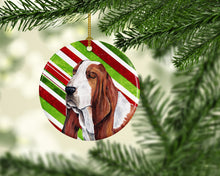 Load image into Gallery viewer, Basset Hound Candy Cane Holiday Christmas  Ornament - Round Ceramic Ornament – Artist-Designed Keepsake Decoration SC9332