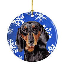 Load image into Gallery viewer, Dachshund Winter Snowflakes Holiday Ornament - Round Ceramic Ornament – Artist-Designed Keepsake Decoration SC9363
