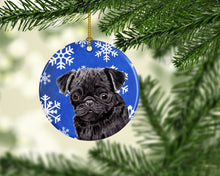 Load image into Gallery viewer, Pug Winter Snowflakes Holiday Ornament - Round Ceramic Ornament – Artist-Designed Keepsake Decoration SC9366