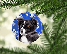 Load image into Gallery viewer, Border Collie Winter Snowflakes Holiday Ornament - Round Ceramic Ornament – Artist-Designed Keepsake Decoration SC9367